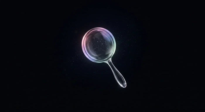 Glass magnifier on a near-black background, representing the best Shopify SEO agencies in 2026